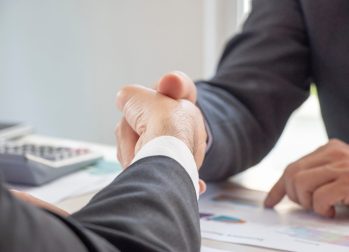 Business hand shaking